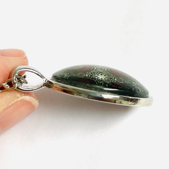 Black and red Celtic cross charm necklace. 1” clear dome front. Chain 18”. New. - Picture 3 of 4